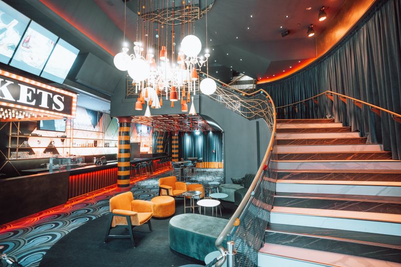 Stylish bar and lounge area inside Green Lantern Pizza