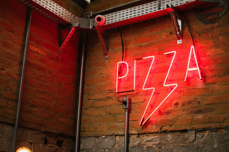 Warm and inviting dining room interior at Green Lantern Pizza